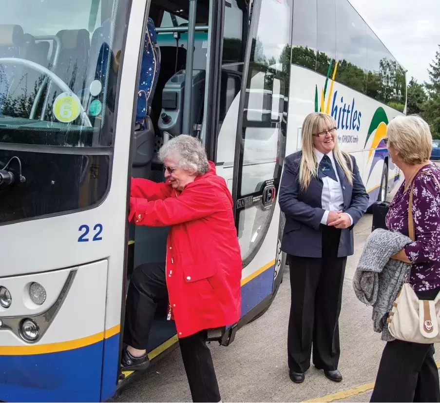 Whittle staff assisting passengers